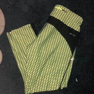 Bright yellow cropped Nike workout leggings